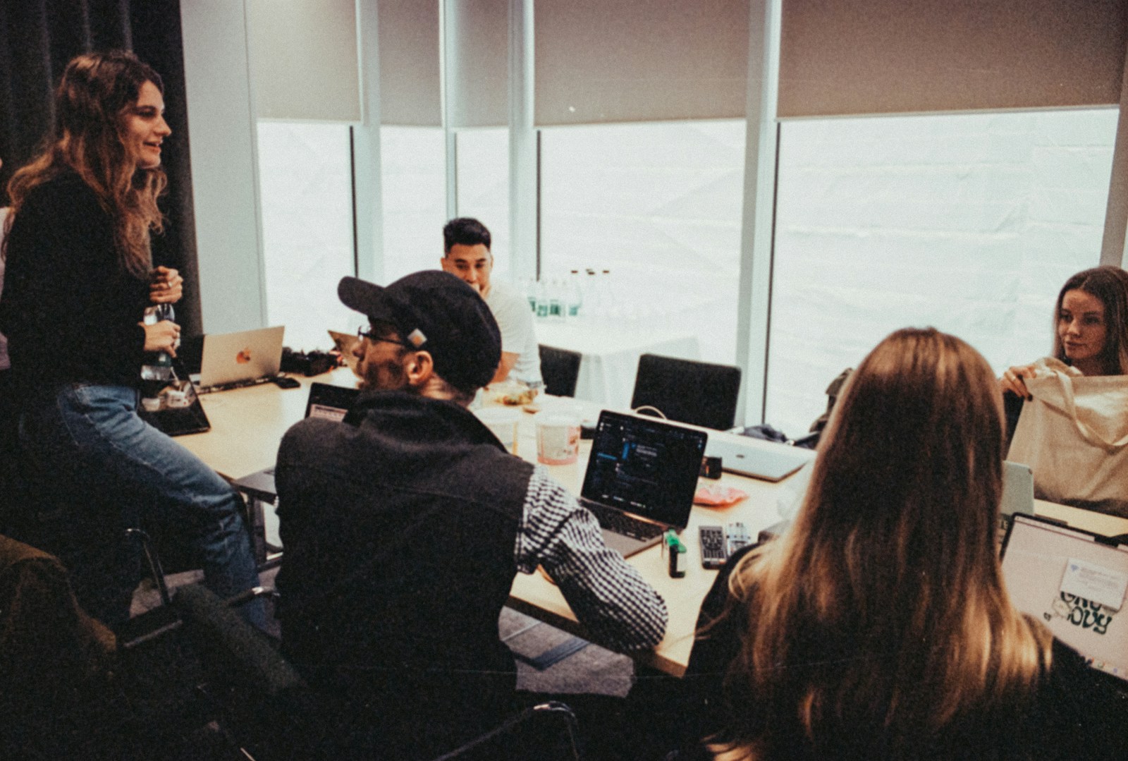 People sharing ideas during a team meeting